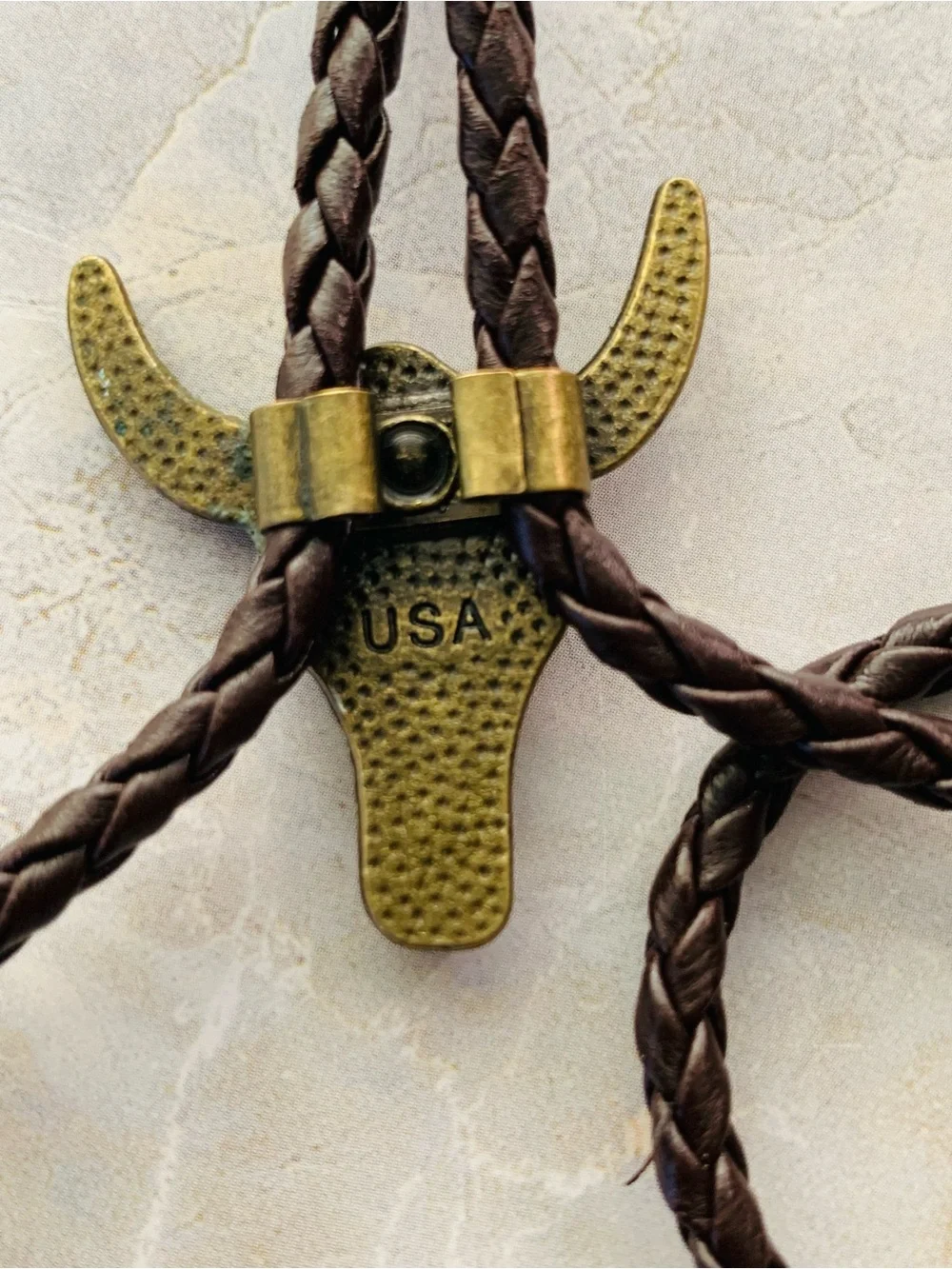 Western Bull Skull Bolo Tie in Brown Leather and Antique Brass